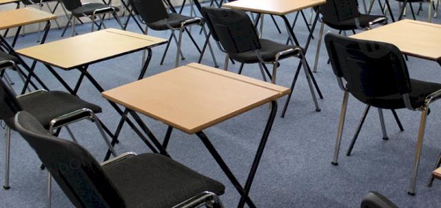 Stacking Chairs Are Great For Exams https://d1hcs5uofxldvl.cloudfront.net/online-furniture-hire/article_additional/london-school-exams10/london-school-exams10-740x350.jpg - Tables & chairs spaced properly ready for exams.