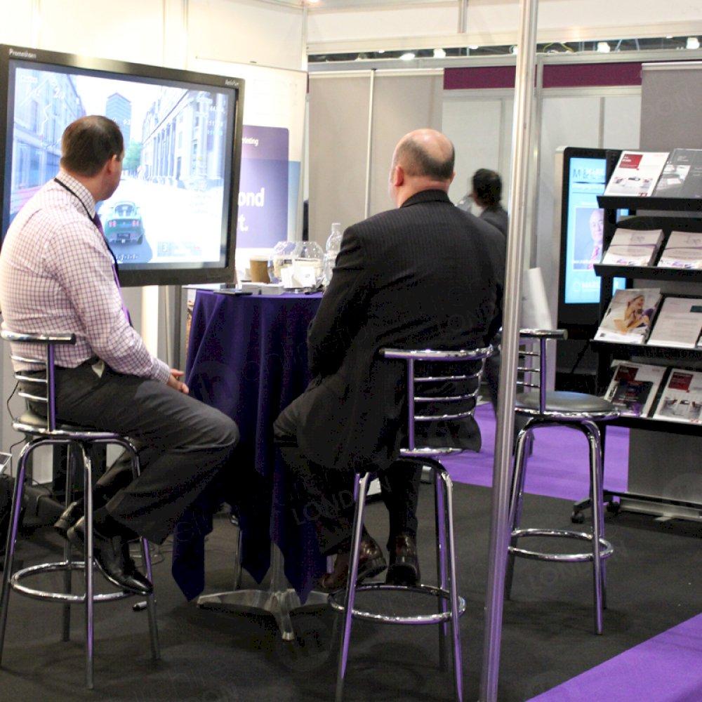 High back stools and poseur tables make a great cubicle team.