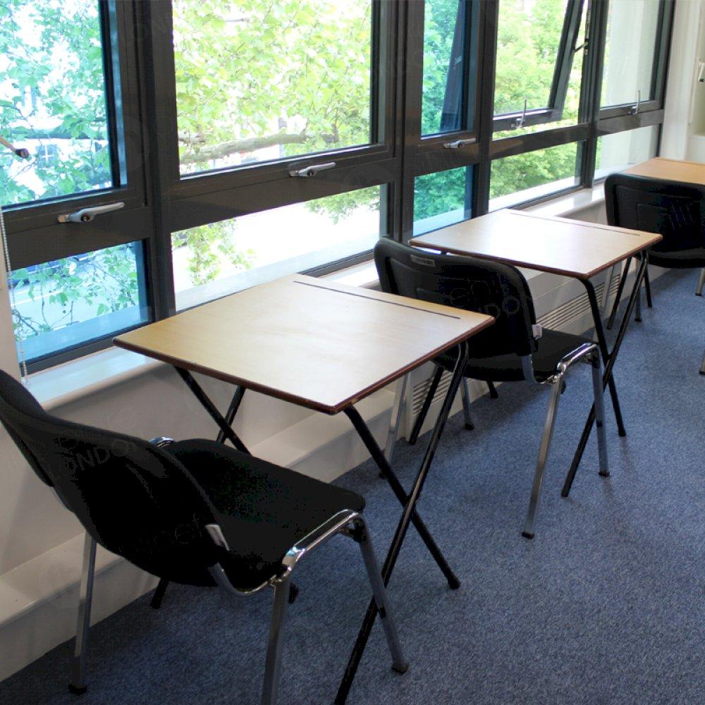 Exam dream team - desks & stacking chairs.